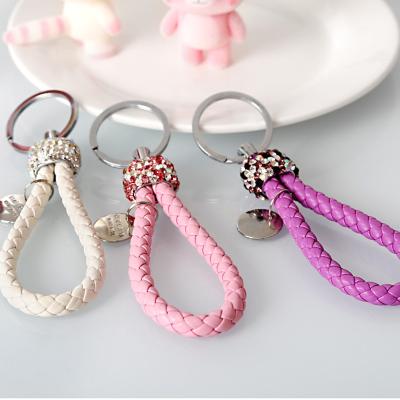 China PU Leather+Handmade Leather Rope Woven Holder Gift Rhinestone Fashion Rhinestone Key Chain Metal Key Rings For Auto Key Storage for sale