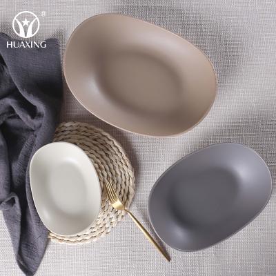 China Sustainable High Quality Oval Colored Matte Tableware Wedding Hotel Used Bulk Nordic Ceramic Dinner Dishes for sale