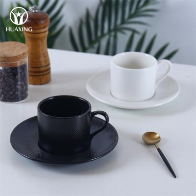 China Sustainable Modern Ceramic Black Cappuccino Coffee Espresso Coffee White Porcelain 200ml Unique Cups And Saucers Set for sale