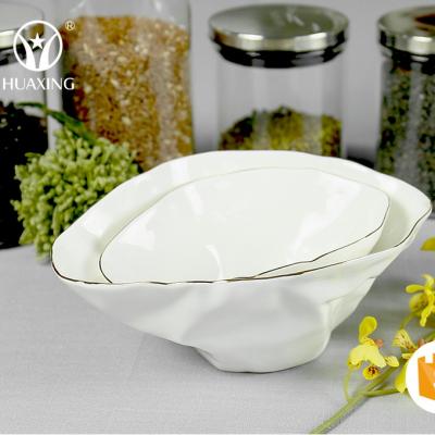 China Sustainable Design Unique White Color Shape Ceramic Bowl Set With Gold Edge for sale