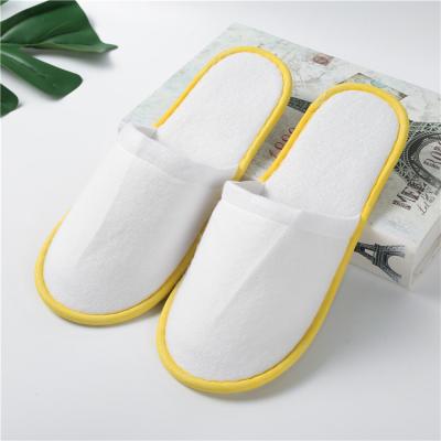 China Cushioning High Quality Amenity Set Disposable Personalized Cheap Hotel Bathroom Slippers for sale