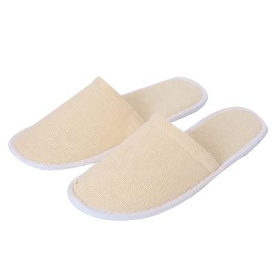 China Cushioning Wholesale OEM Logo Custom Hotel Disposable Adult Slippers for sale