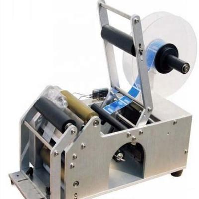 China Beverage Round Bottle Labeling Machine For Round Bottles Sticker Label Packing Machine for sale