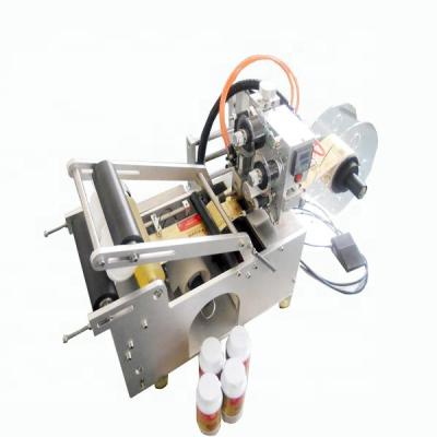 China High Performance Beverage Semi Automatic Round Bottle Labeling Machine for sale