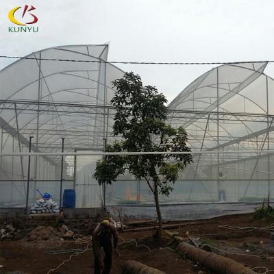 China Net Shade House Hemp Shade Foshan Kunyu Ventilation Roof Sawtooth Special Type Greenhouse for sale