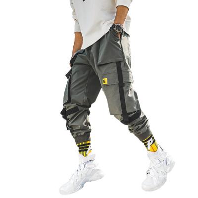 China Anti-wrinkle 2021 new fashion design loose fit men's cargo pants 6 pockets men's casual jogger pants for sale