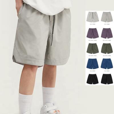 China New Summer QUICK DRY Custom Trend Solid Color Drawstring Casual Stretch Split Loose Streetwear Mens Shorts for sale