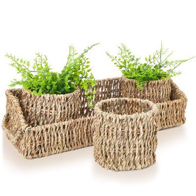 China Cheap Decorative New Minimalist Style Sea Grass Basket Straw Storage Basket With Handle for sale