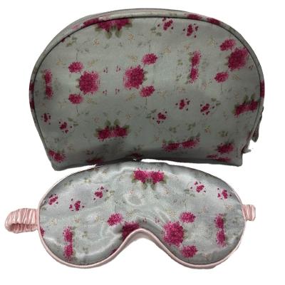 China Durable Custom Made Fashionable Cosmetic Organizer Zipper Half Moon Satin Pouch Floral Makeup Wash Bag for sale