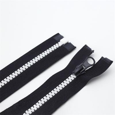 China Other supply antifading 5# resin zipper in short with high end black woven belt for sale