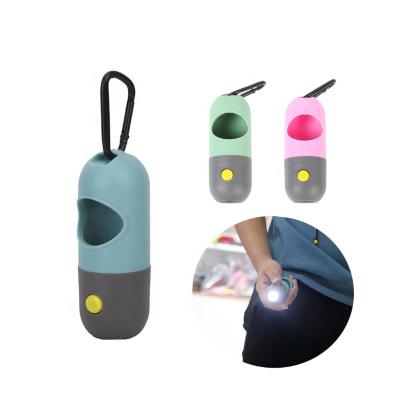 China Viable Portable Pet Supplies Dog LED Poop Bag Storage Box Custom Pet Waste Bag Capsule Dispenser for sale