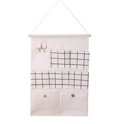 China Single Viable Lattice 7 Pockets Hanging Bag Wall Cabinet Organizer Hanging Storage Bag For Bedroom Bathroom for sale