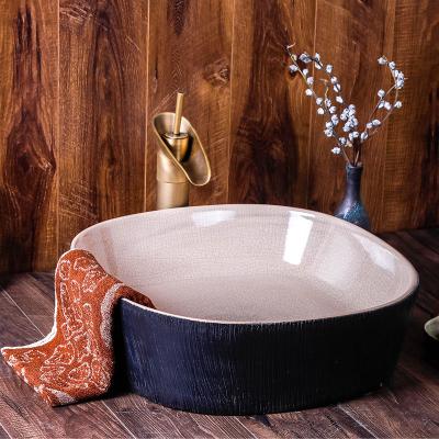 China 1300 Degree Fired Jingdezhen Blue Ceramic Artistic Sinks Split Ice Color To Wholesale And White Handmade Luxury Bathroom Basin for sale