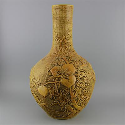 China Traditional Chinese Hand Carved Chinese Ceramic Yellow Vase With Peach Design For Home Decoration for sale