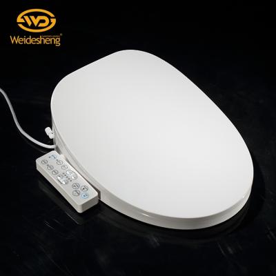 China Electronic Multifunctional Comfortable Pure White Bidets Remote Control Smart Toilet Seat Cover for sale