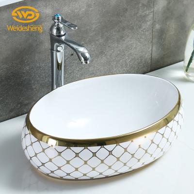 China Hand Wash Long Service Life Oval Single Hole Gold Plated Ceramic Art Face Wash Hand Wash Basin Basin Wash Sink for sale