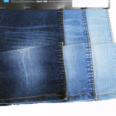 China Breathable Stretch Denim Fabric Pants Fabric Indigo Cotton Polyester Spandex Customizable Denim for sale