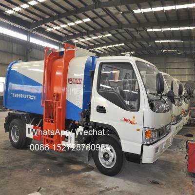 China Carbon Steel. Stainless Steel JAC 4x2 RHD 5m3 Garbage Removal Vehicle Bucket Garbage Truck Side Loader Hanging Garbage Truck for sale