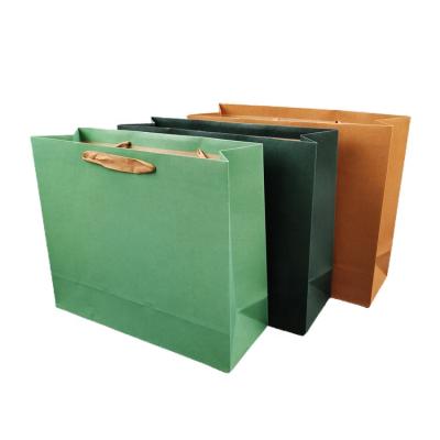 China Boutique Recyclable Custom Carrier Packaging Foldable Reusable Paper Bag Paper Shopping Bag With Logo for sale