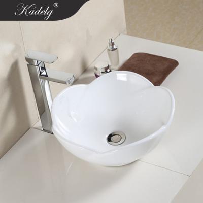 China Modern Flower Shape Small Ceramic Counter Top Bathroom Sink Basin for sale