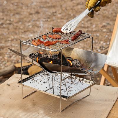 China Eco-friendly Folding Fire Stand Stainless Steel Grill Wood Charcoal Portable Outdoor Portable Camping Stove for sale