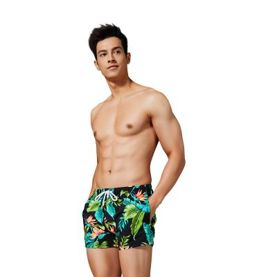 China New Mid-waisted Breathable Beach Multicolor Quick Dry Floral Loose Short Pants For Men for sale