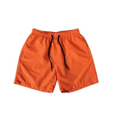 China Anti-wrinkle 2023 summer new arrival pure color polyester quick-dry casual men's beach short pants for sale