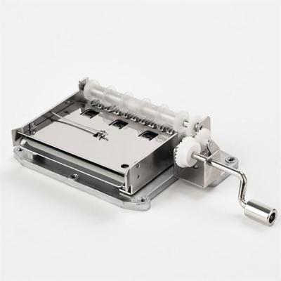 China Mechanical Hand Cranked Metal 30 Note Music Box Tape And Paper Punch for sale