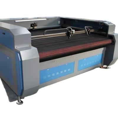 China Laser CUTTING Automatic Feeding Embroidery Textile Leather Wool Felt Cotton Home Fabric CO2 Laser Cutting Machine for sale