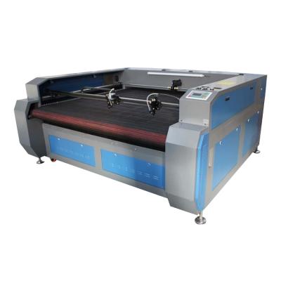 China Laser CUTTING Auto Feeding CO2 Cloth Fabric Textile Laser Cutting Machine 1610 for sale