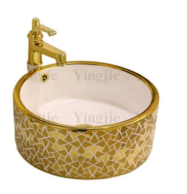 China Round Shape Luxury Luxury Wash Basin, Ceramic Gold Colored Sink For Washroom for sale