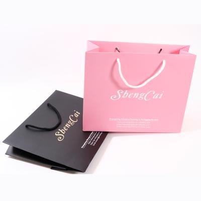 China Recyclable Custom Printing Art Paper Matte Laminated Small Pink Cosmetic Shop Jewelry Accessories Packaging Bags With Logo for sale