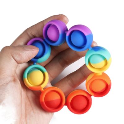 China Durable AA006 Children Squeeze Toys Sensory Anti Strain Wristband Push Bubble Bracelets Silicone Rainbow Bead Stirrer Bracelet for sale