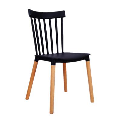 China Modern Nordic Colorful Armless Plastic High Back Chair With Beech Wood Legs Plastic Dining Chair for sale