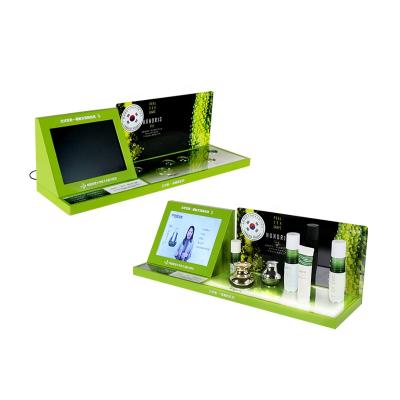 China JL128 Makup Acrylic Top Acrylic Perfume Counters Stand Essential Oil Skin Care Product Beauty Product Display With Monitor for sale