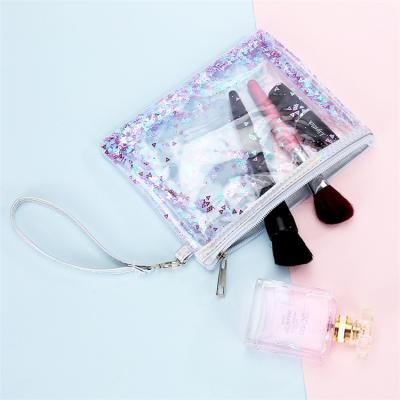 China Fashion Women Clear Transparent Makeup Bag Glitter PVC Cosmetic Bag With Zipper for sale