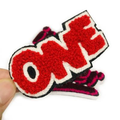 China Viable Custom Letter Embroidery E-Xiu Logo Iron On Self Adhesive Embroidered Chenille Patches For Apparel Coat, Hoodies, Sweater for sale