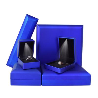 China Fashionable luxury LED blue light jewelry box, a little blue jewelry box ring box pendant LOGO custom made. for sale