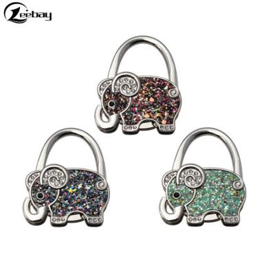 China Nickel Free Metal Mini Foldable Table Bag Hanger Hook Bag Purse Holder Elephant Shaped Hanger for sale