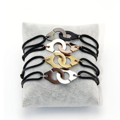 China Religious braid with stainless steel couple jewelry new products woven handcuff bracelet female handcuff bracelet for sale