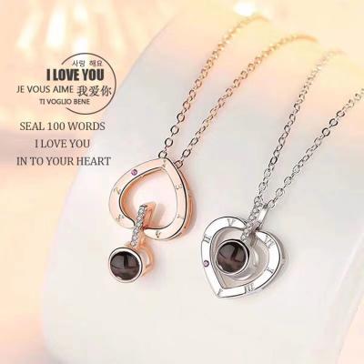 China Hiphop 925 Sterling Silver I love you Crystal Heart Necklace Romantic Chain 100 Language Projection Pendant for valentines day gifts for sale