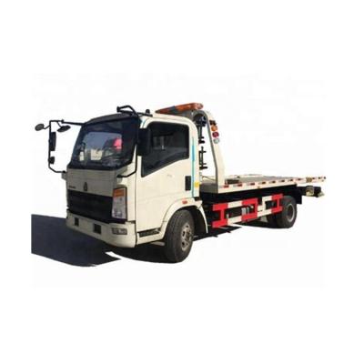 China China howo 6 wheels flatbed wrecker towing recovery lift one car per arm crane remote control folding 2500kg wrecker for sale