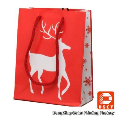 China Bolsos de papel respetuosos del medio ambiente del regalo de la Navidad con el logotipo impreso aduana en venta