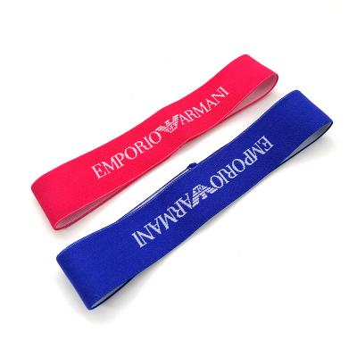 China Popular Designer Sports Elastic Fitness Accessories Letter Elastic Headband Running Antiperspirant Hair Band For Women Girls for sale