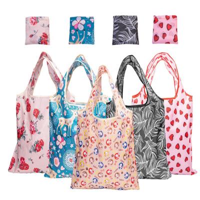 China Custom Folding Handbag Floral Print Large Capacity Polyester Hand Folding Reusable Shopping Bag for sale