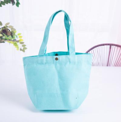 China Custom Button Design Solid Color Canvas Foldable Reusable Grocery Handled Tote Bag Women for sale