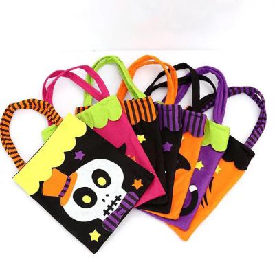 China Halloween Candy Sublimation Trick or Treat Bags Halloween Nonwoven Hand Held Candy Bags Wholesale for sale