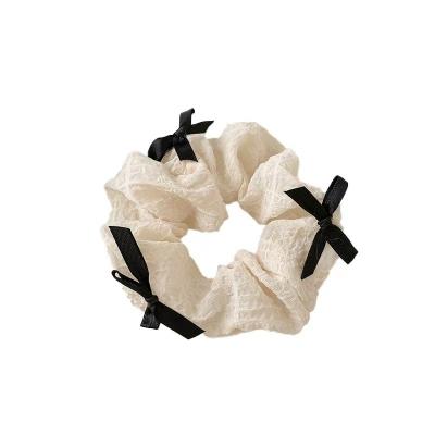 China Dress up Sweet style bow tie hair loop elegant black and white pleated fabric super immortal puff large intestine hair loop accessories for sale