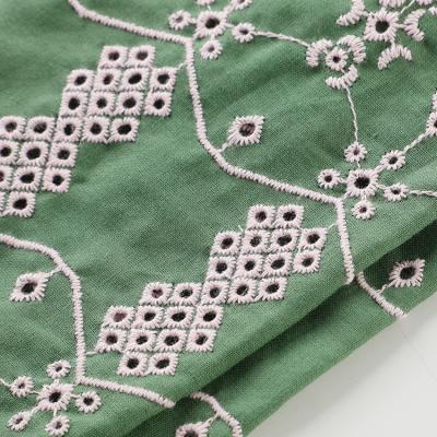 China New Design Anti-static Comfortable Green Embroidered Breathable 100% Eyelet Cotton Dress Fabric for sale