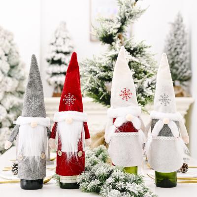 China 2020 New Forest Elderly Wine Bottle Cover Dining Table Wine Bottle Cover Christmas Snow Hat Christmas Decorations Nonwoven Fabric for sale